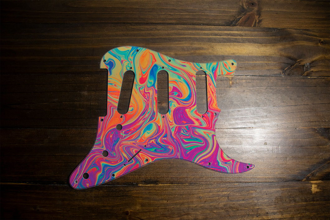 The Jerry, psychedelic strat SSS image. Blue, Pink, Purple, Orange Green Red swirl. 